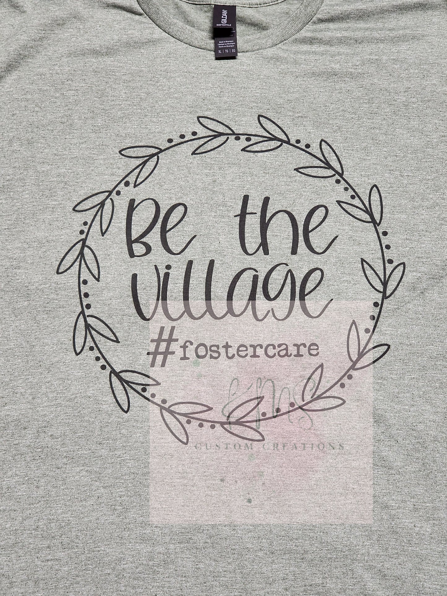 Be the village t-shirt